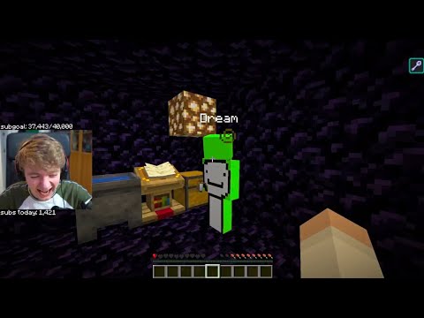 A screenshot from Tommy's stream. He's in the prison cell with Dream. A cauldron, a lectern with a book on it, and a chest sit behind Dream. Tommy's on half a heart, but he's laughing about something.
